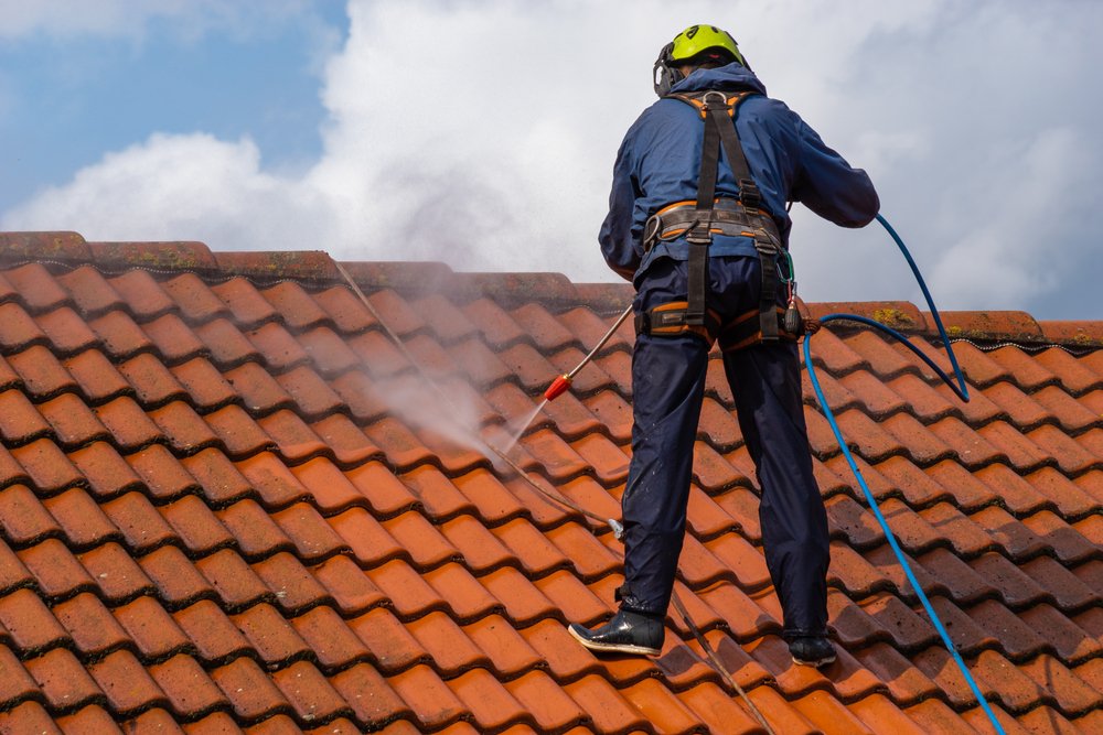 Roof cleaning and sealing service